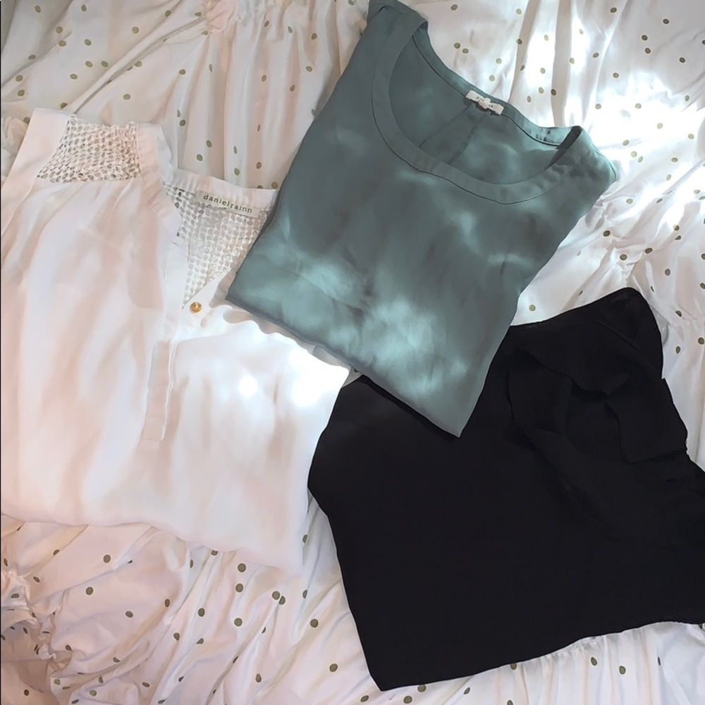 Bundle of work blouses.